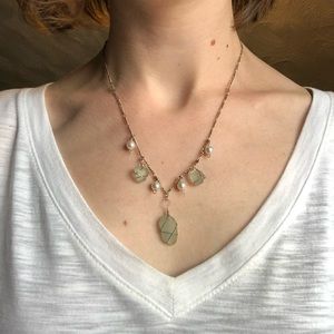 Silver necklace with pearl and green stones
